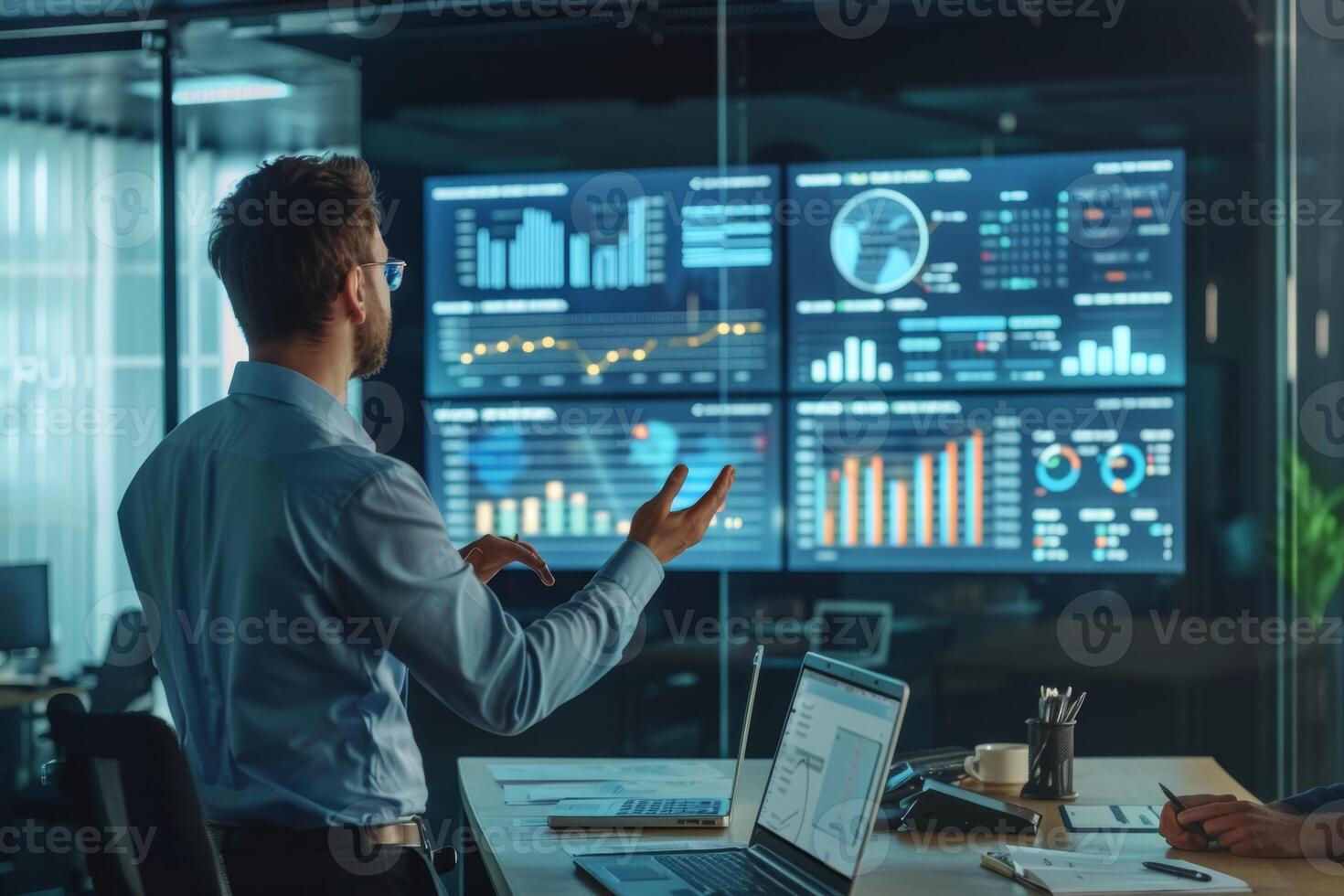 Project Manager Presenting Status Report with Charts and Data Visualizations in Modern Office photo