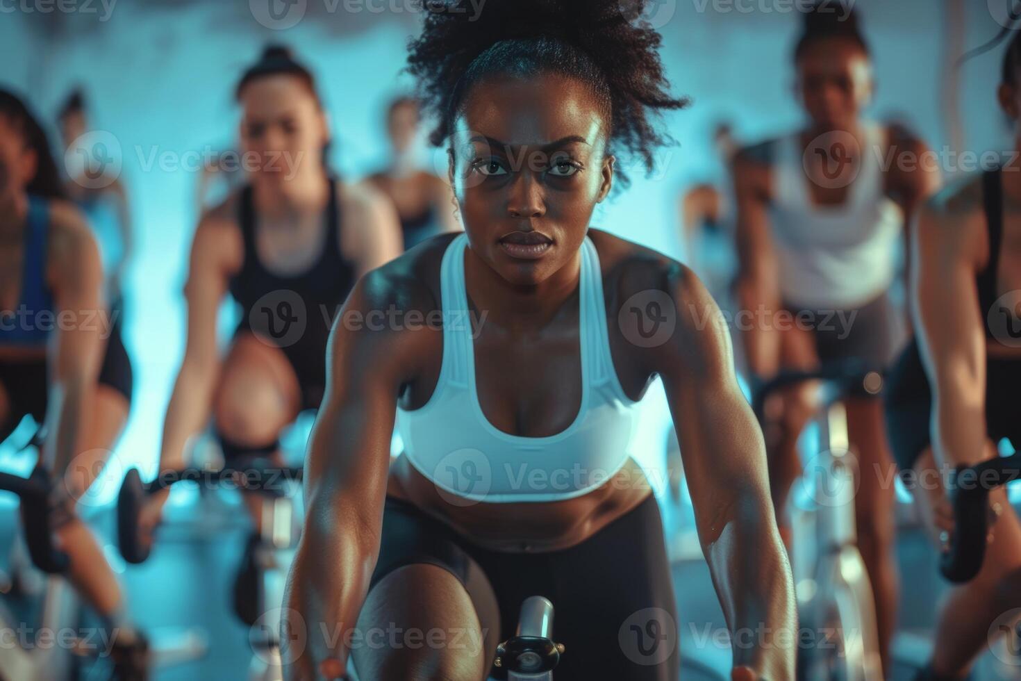 High-Energy Spin Class Led by Dynamic Instructor with Motivational Music photo