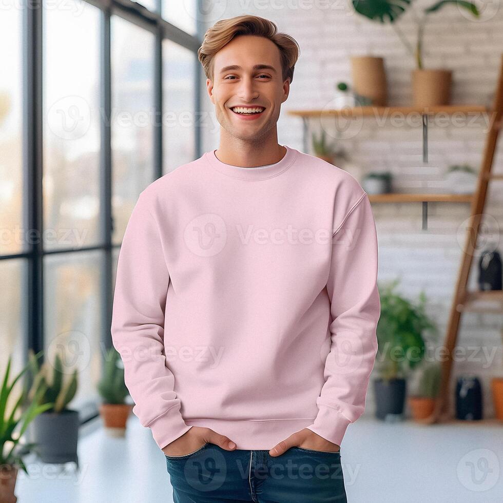 smiling blonde man in pink sweater mockup , standing in livingroom background art photo