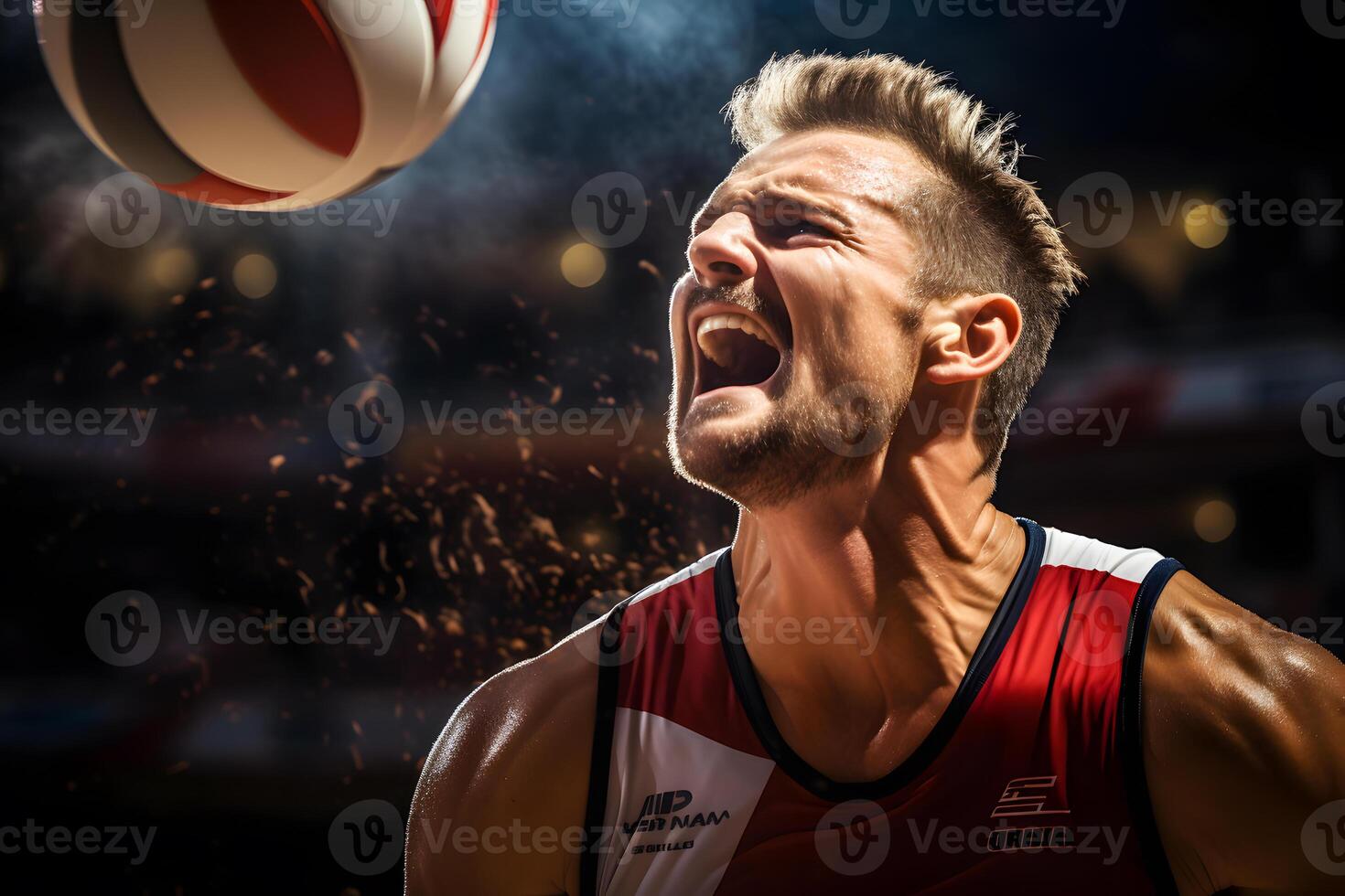 A player in a red and white jersey is enjoying a volleyball match photo
