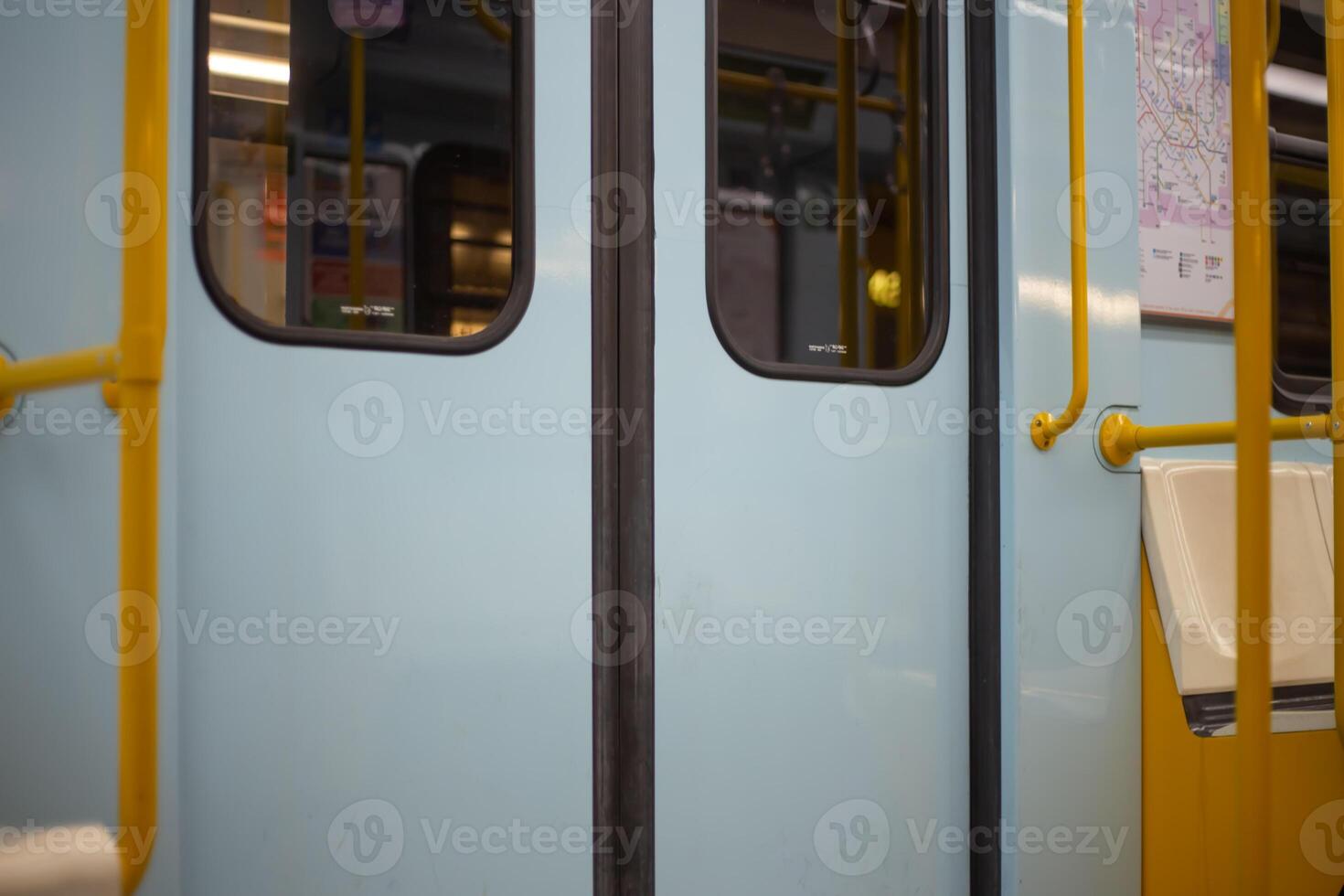 Closed doors in a subway car. An empty train waits at the San Donato metro station in Milan. Public transport concept photo