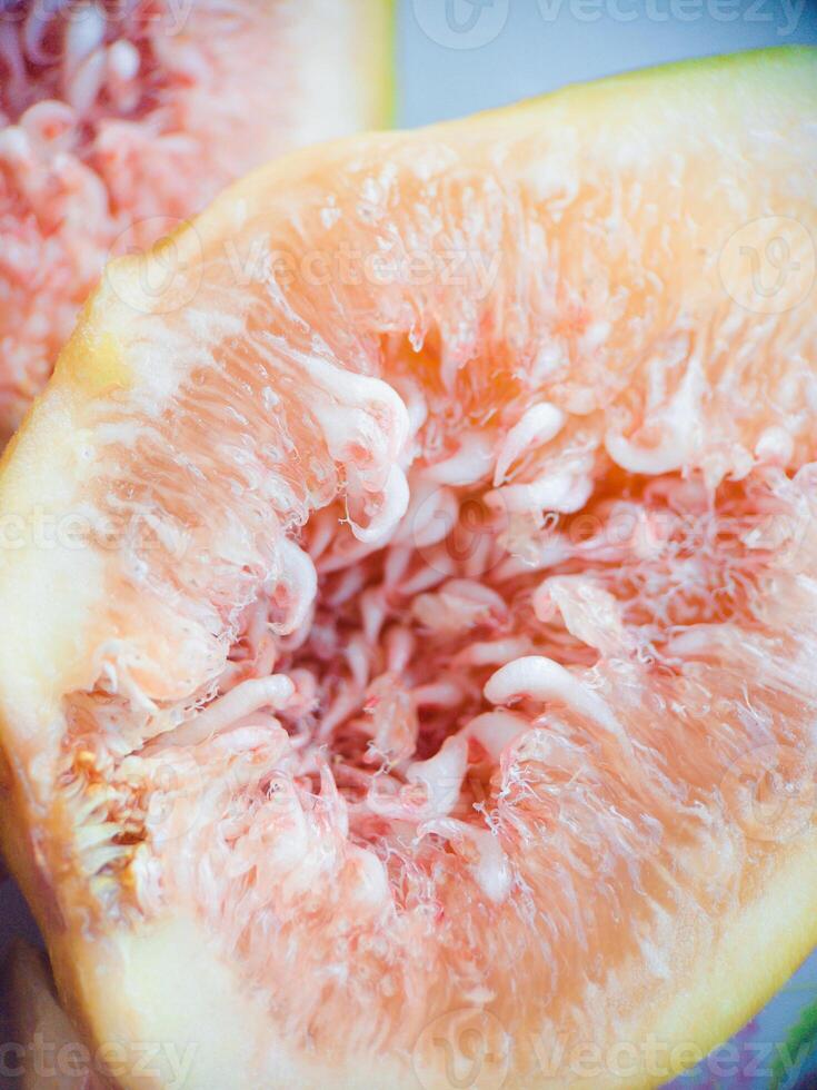 Fresh fig fruit pulp macro soft focus close up. Organic food beautiful background. Harvesting figs. Shallow depth of field fruit texture. High quality photo