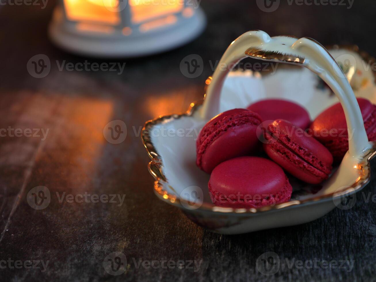 Macaroons and lantern moody food background. High quality photo
