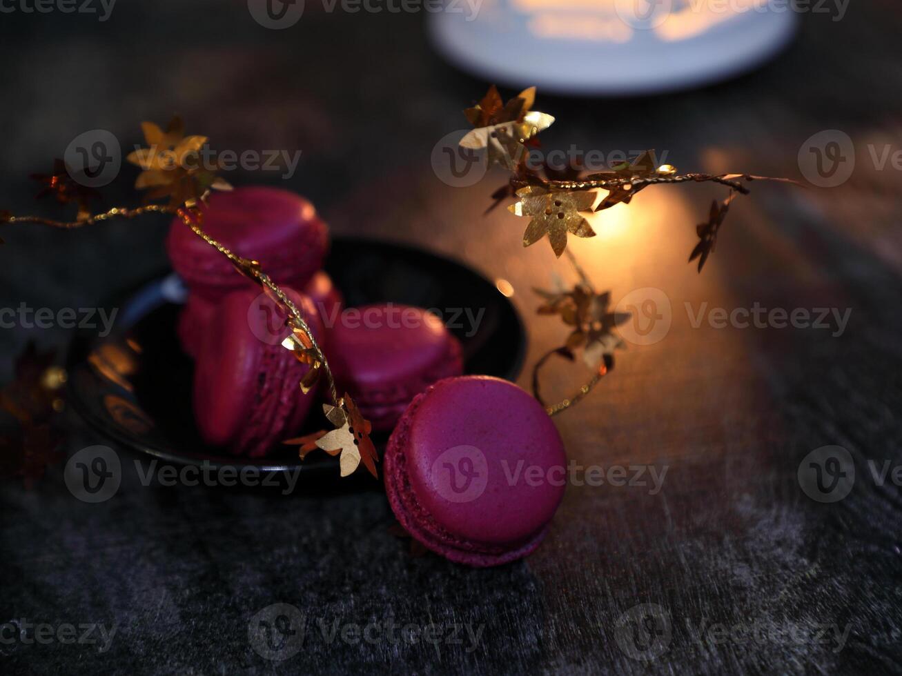 Macaroons and lantern moody food background. High quality photo