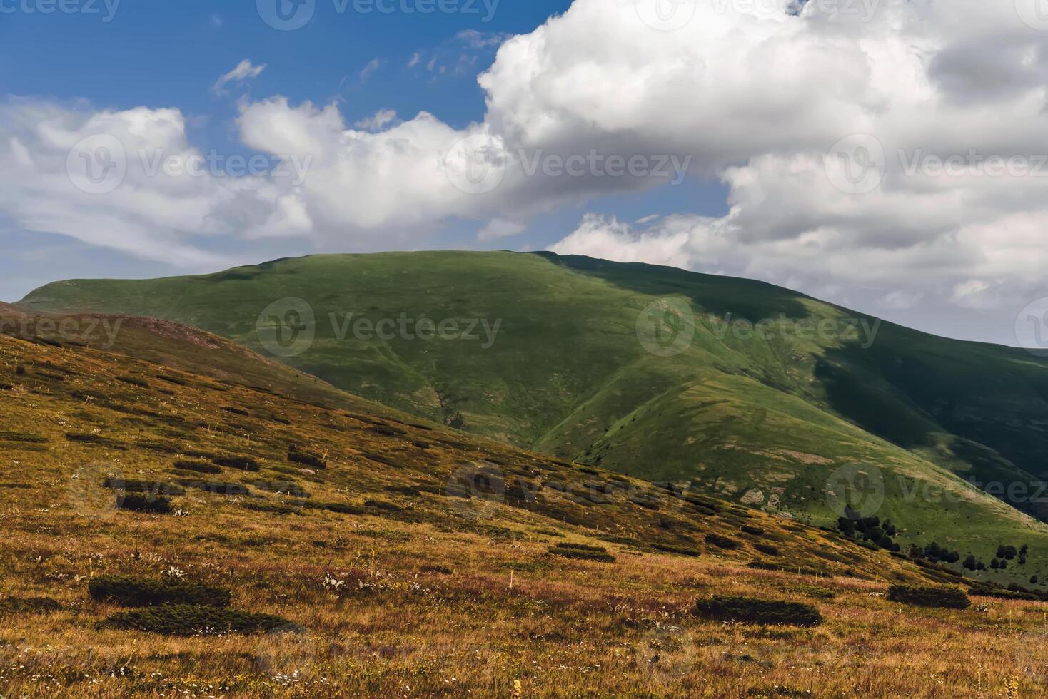 Summer Mountain Landscape with Dramatic Clouds photo