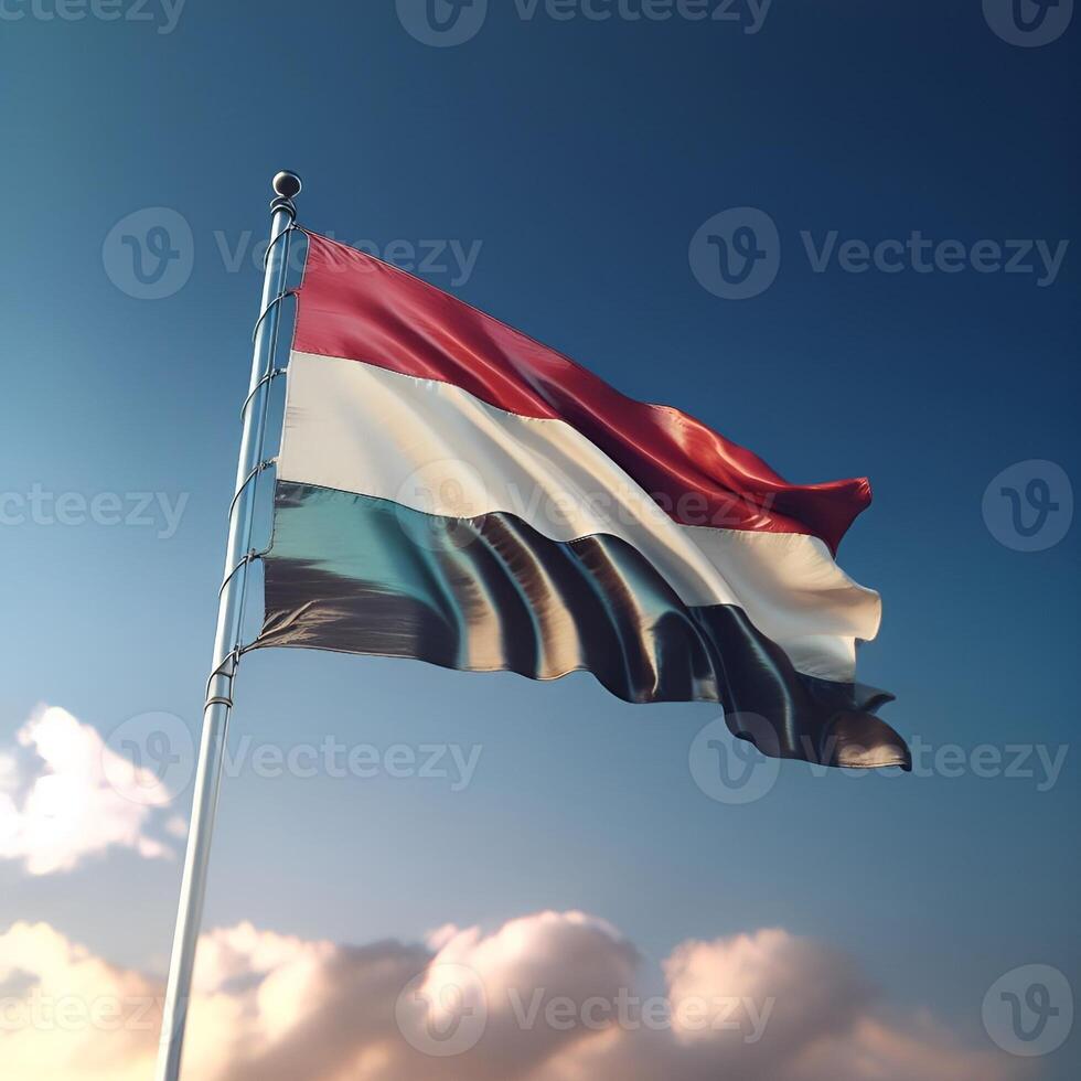 Proud Flutter of the Yemen Flag Against the Sky photo