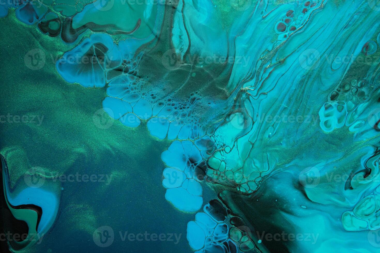 Fluid Art. Green and blue abstract wave swirls on black background. Marble effect background or texture photo