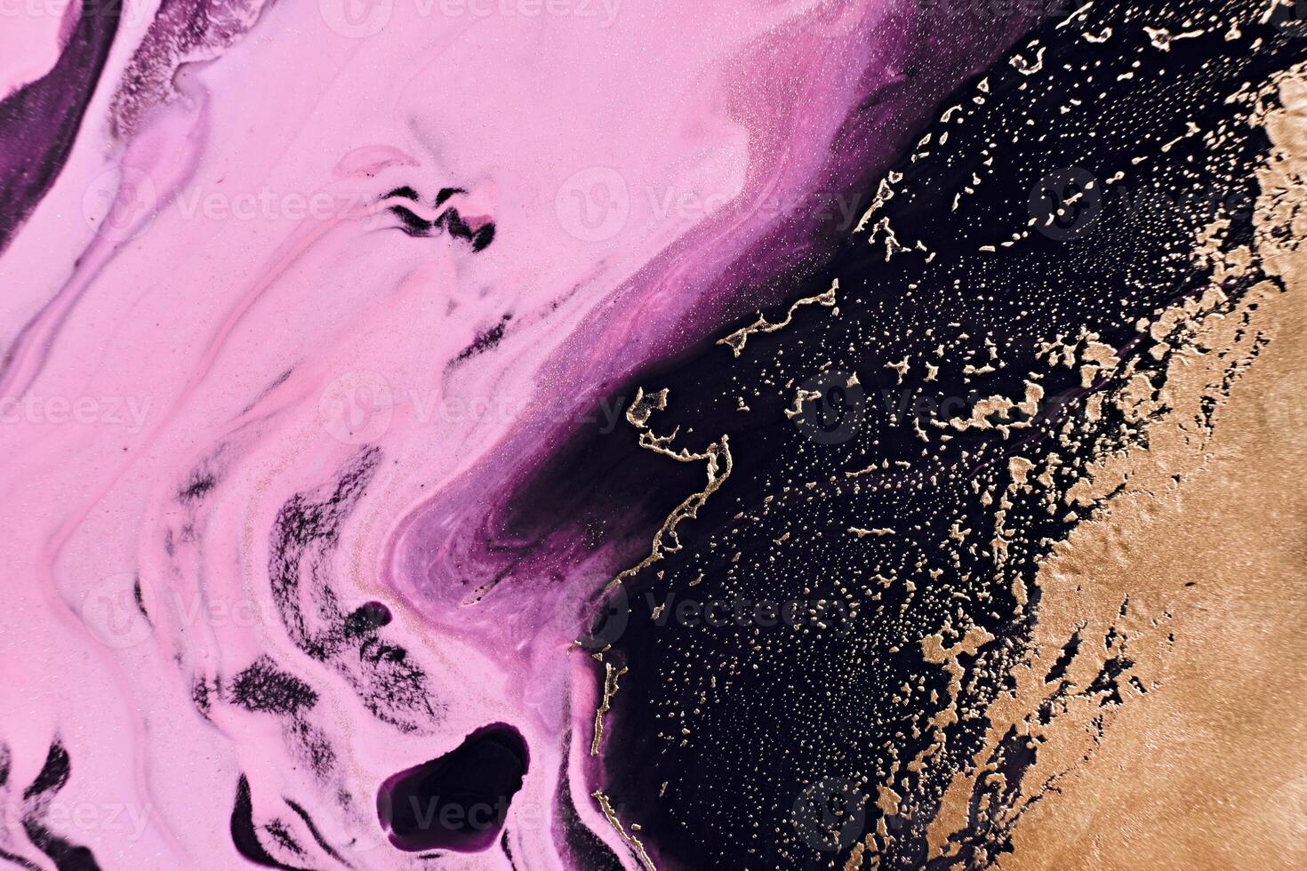Fluid Art. Golden metallic, black and pink wriggling waves. Marble effect background or texture photo