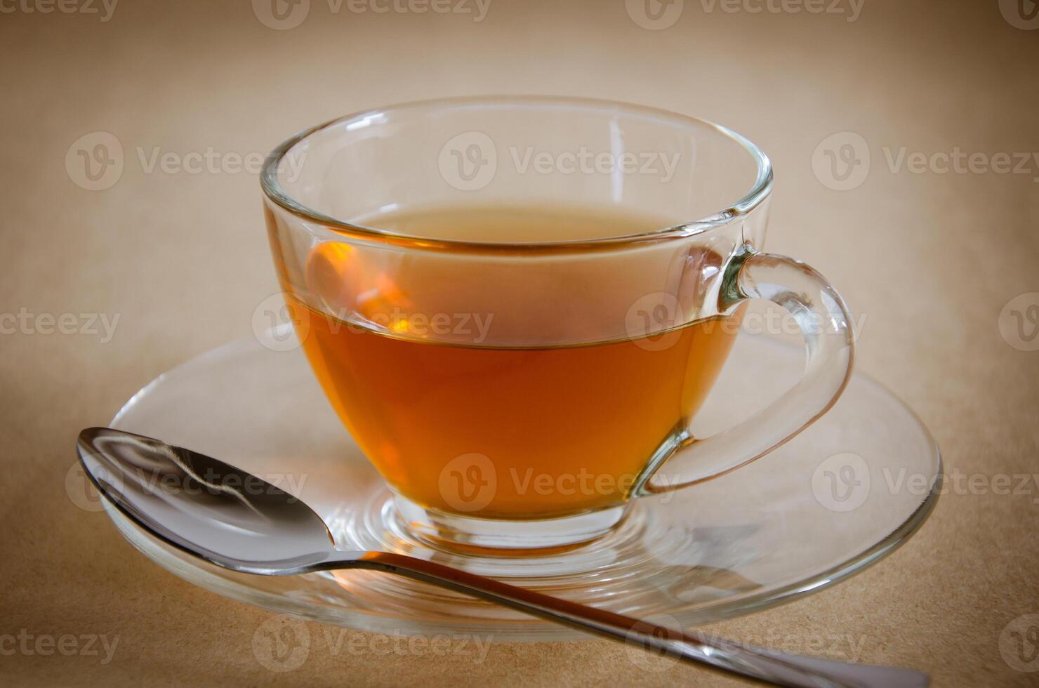Glass Cup of Tea and Chocolate Cake for Tea Break photo