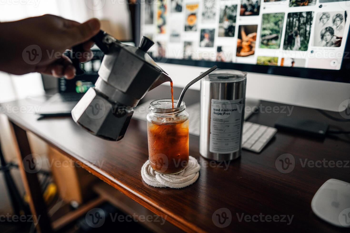 Make iced coffee from a moka pot and pour it into a glass. photo