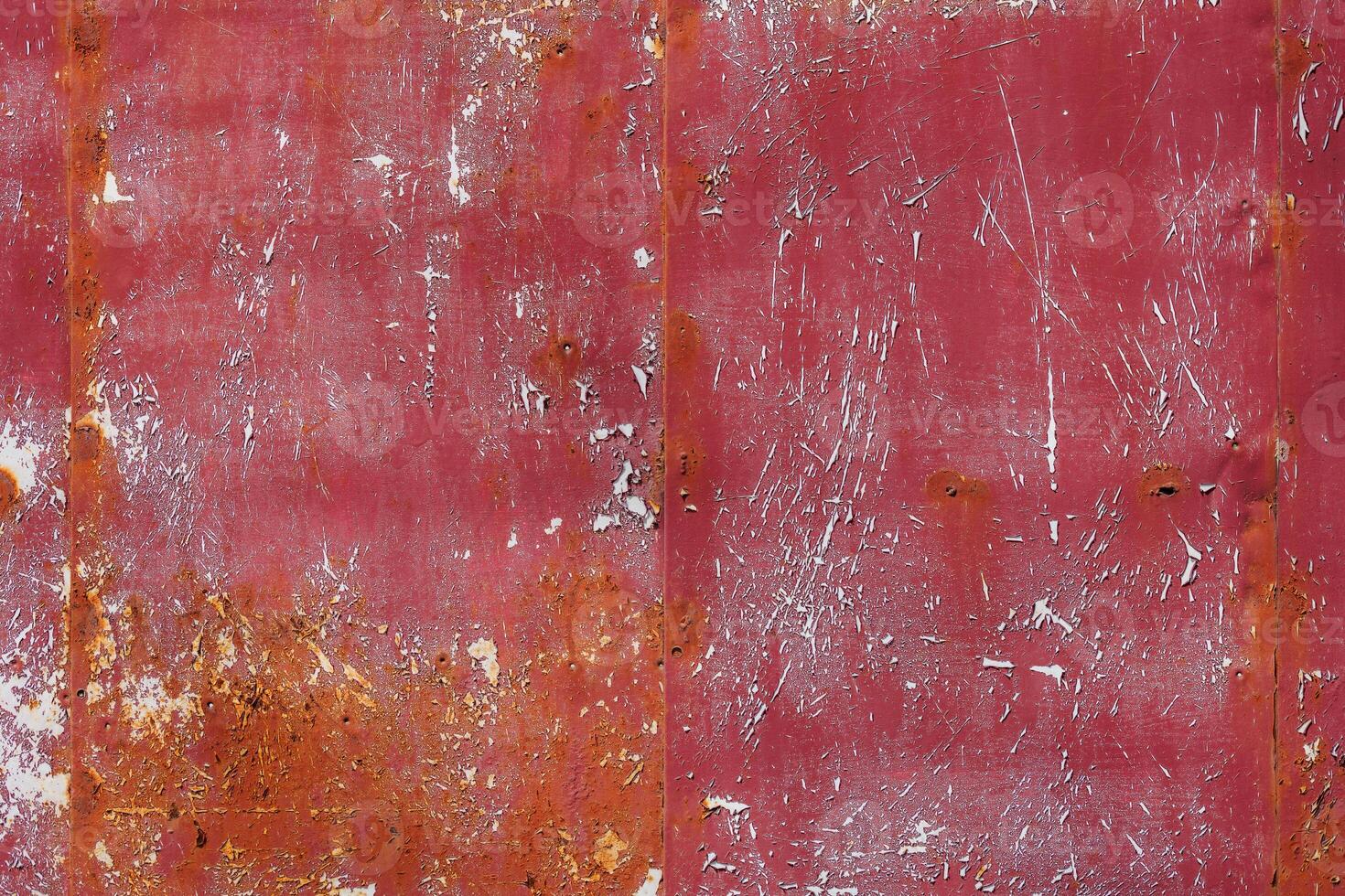 rusty red painted flat sheet metal surface full-frame background and texture photo