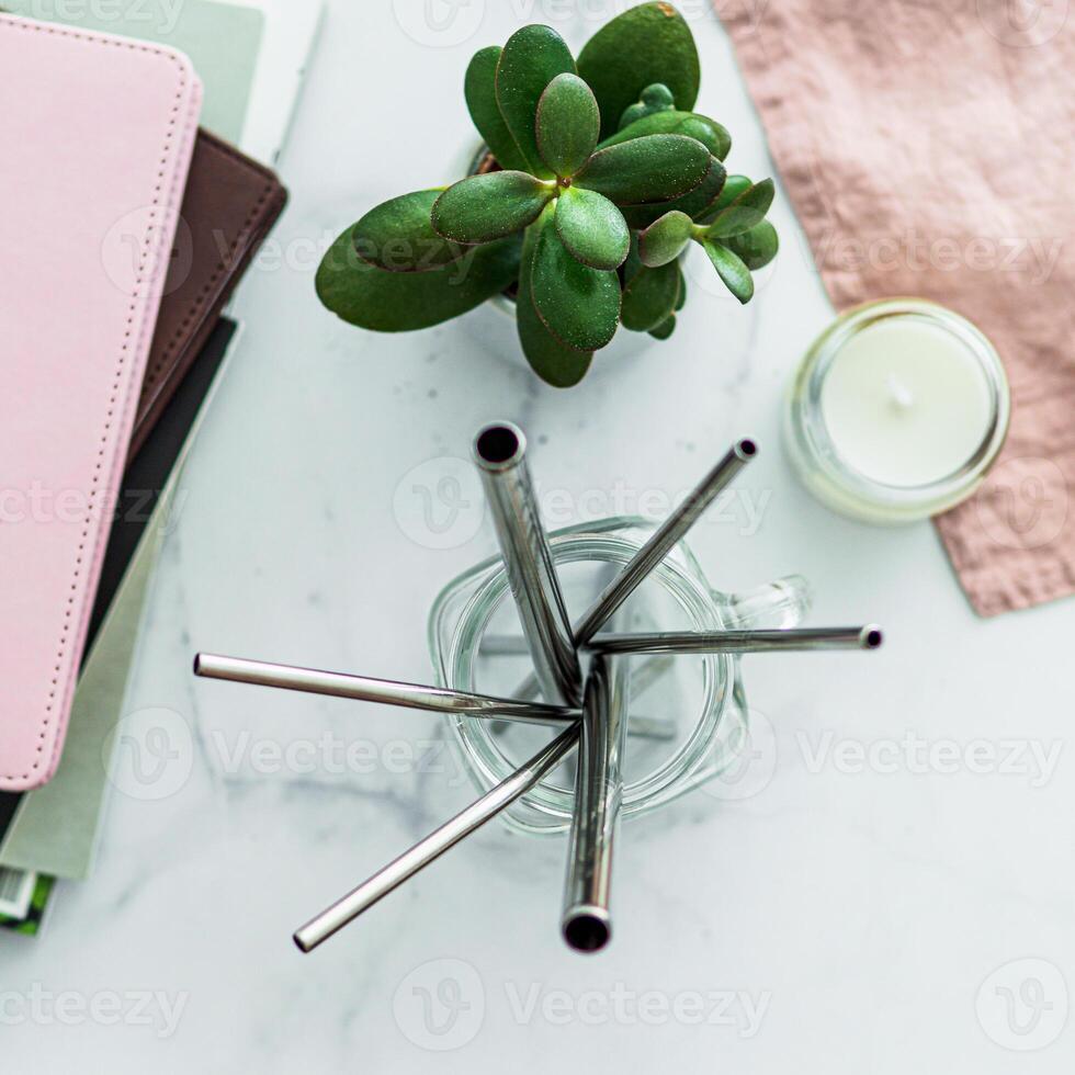 Metal recyclable drinking straws, copy space photo