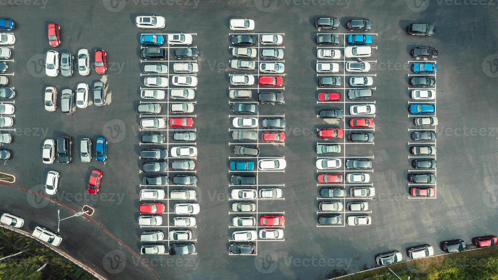 Drone top view of lot of cars parked on car park photo