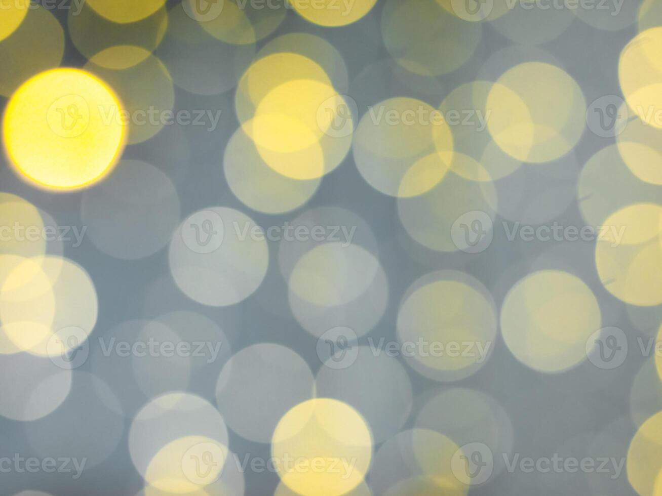 gold abstract background with bokeh defocused lights photo