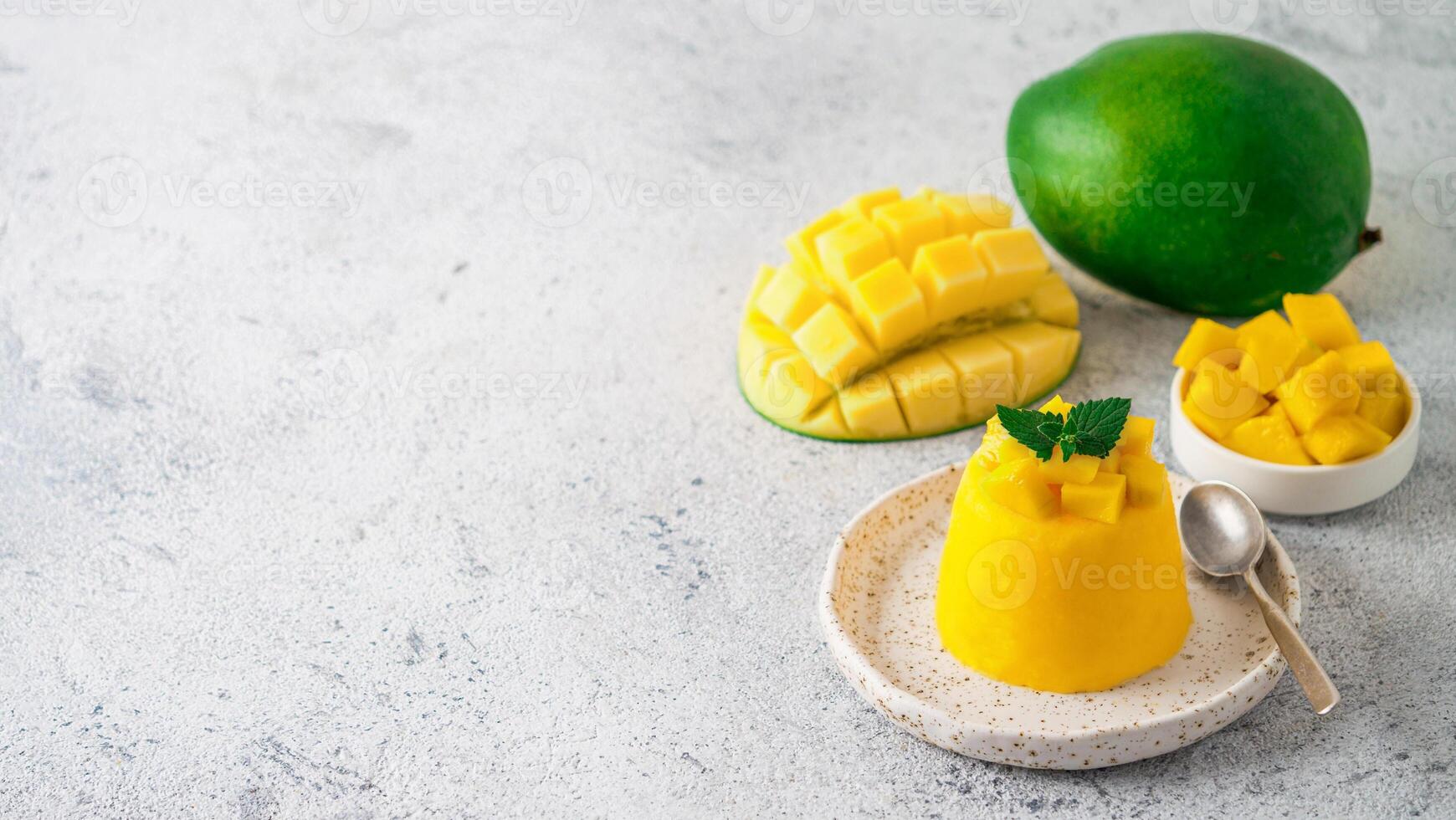 Mango Mousse on gray background, copy space photo