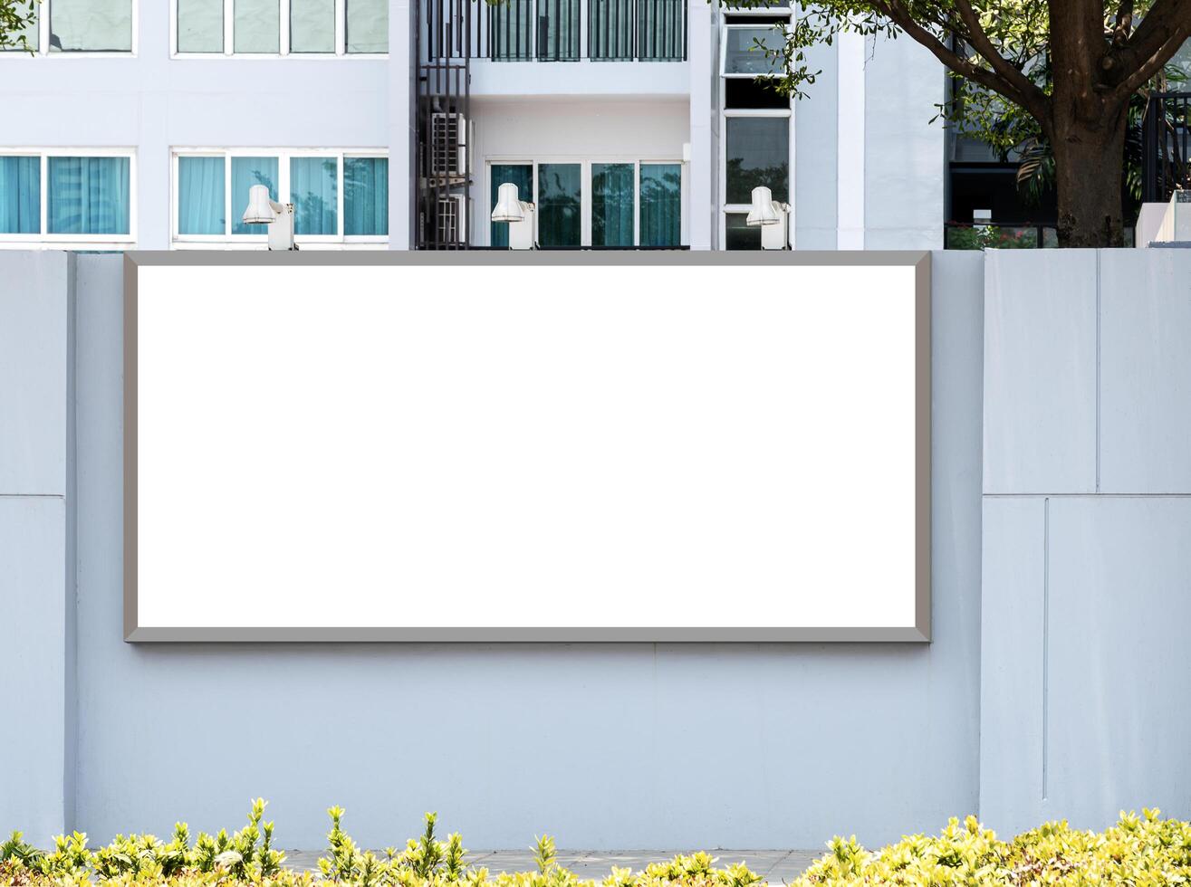 Mock up white horizontal light box billboard on wall at entrance building. Clipping path for mockup photo