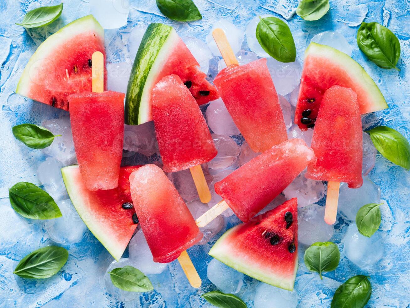 Top view of watermelon and basil popsicles photo