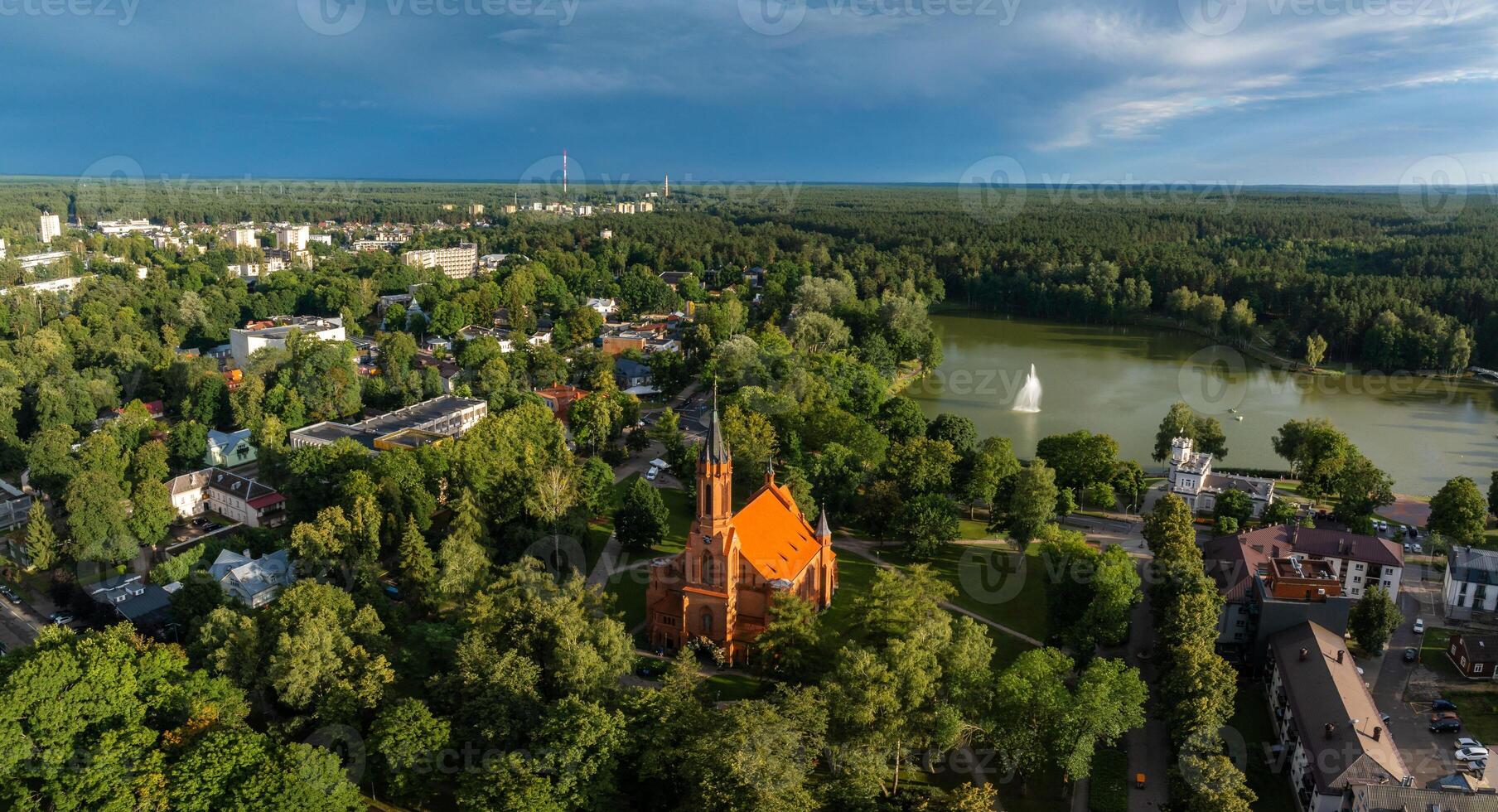 Aerial panoramic view of Lithuanian resort Druskininkai. Druskininkai in autumn colours, drone picture of multi coloured trees in most beautiful city of Druskininkai in Lithuania photo