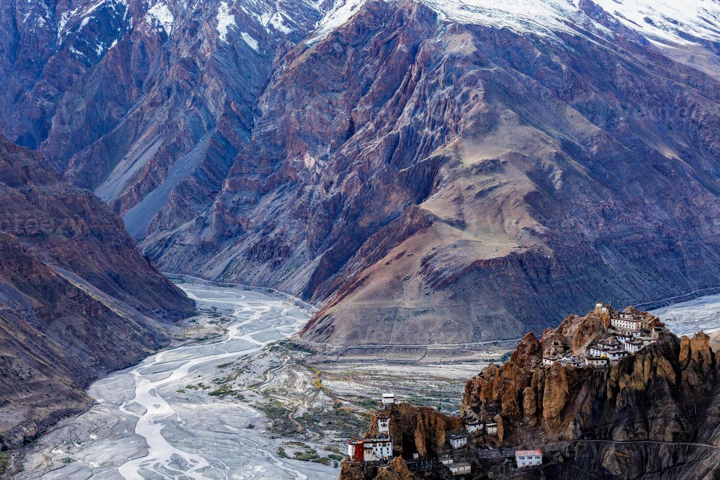 Dhankar monastry perched on a cliff in Himalayas, India photo
