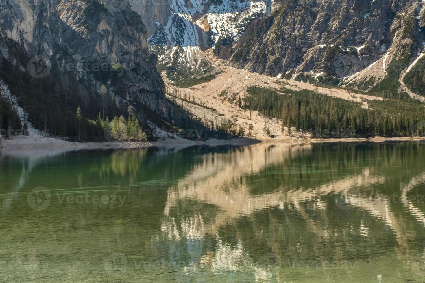 Lake Braies in Dolomite Alps photo