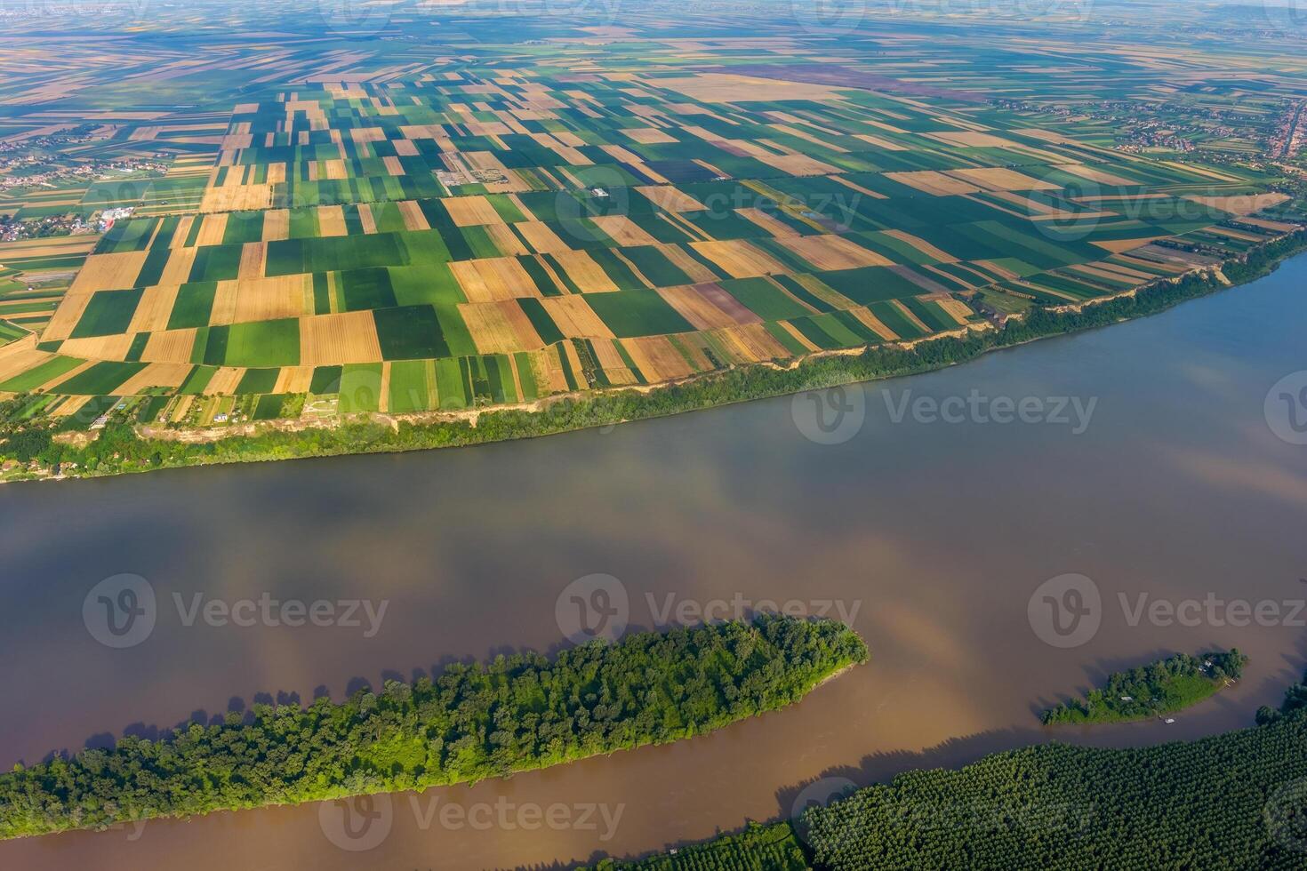 Aerial view of fields on bank of Danube photo
