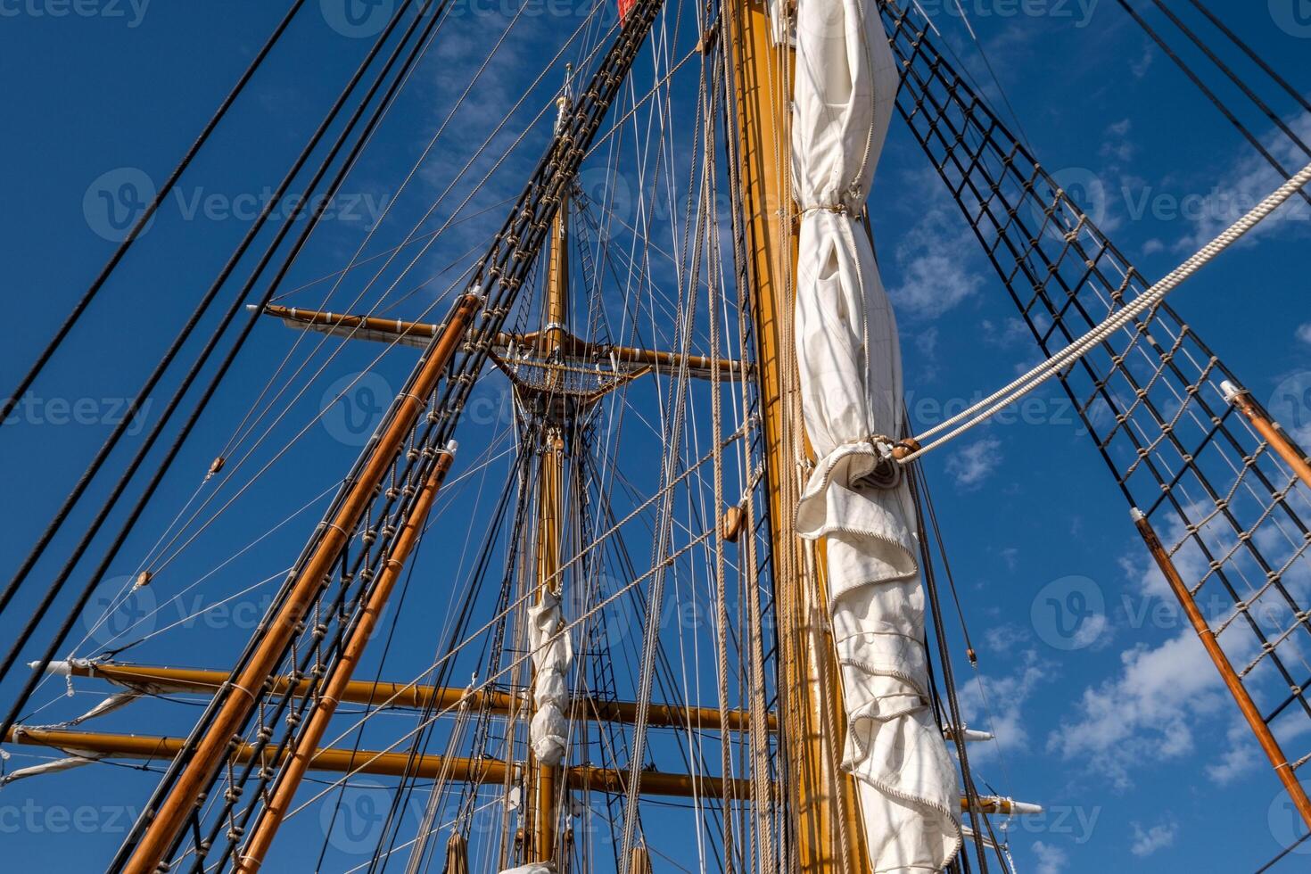 Sailboat wooden ship masts and rigging photo