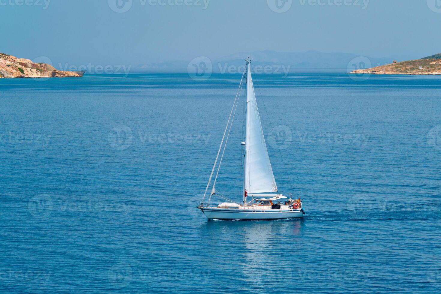 Yacht boat in Aegean sea near Milos island , Greece photo