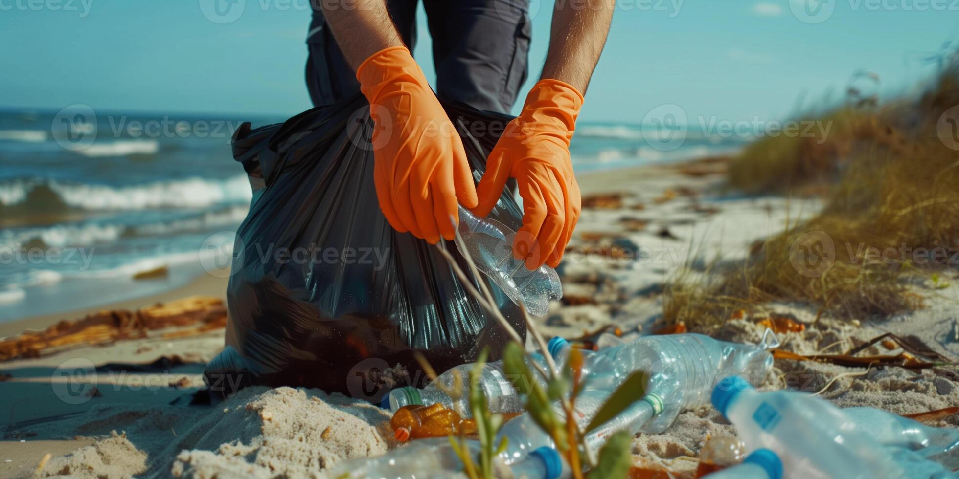 Volunteer picking up plastic trash on beach. Problem of environmental pollution by plastic and its recycling. photo