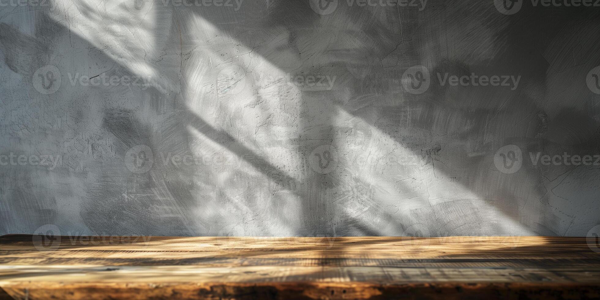 Mockup for product display. Wooden tabletop with shadow on grey concrete wall background. photo