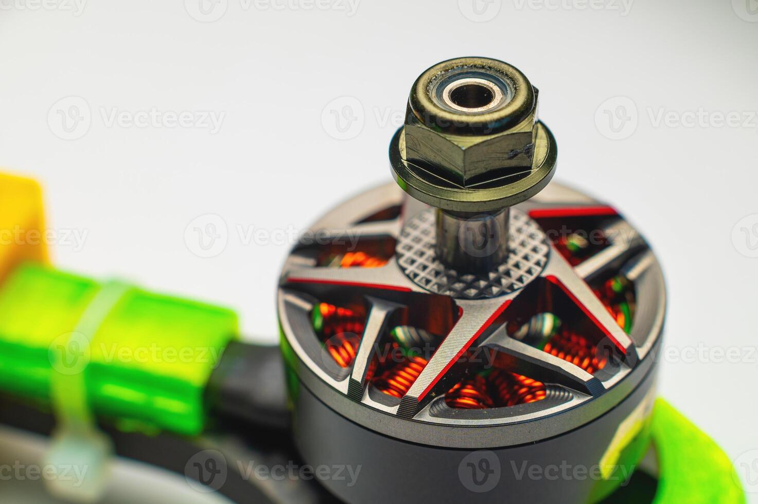 Close-up Small brushless electric motor for drone. Extreme macro photography. photo