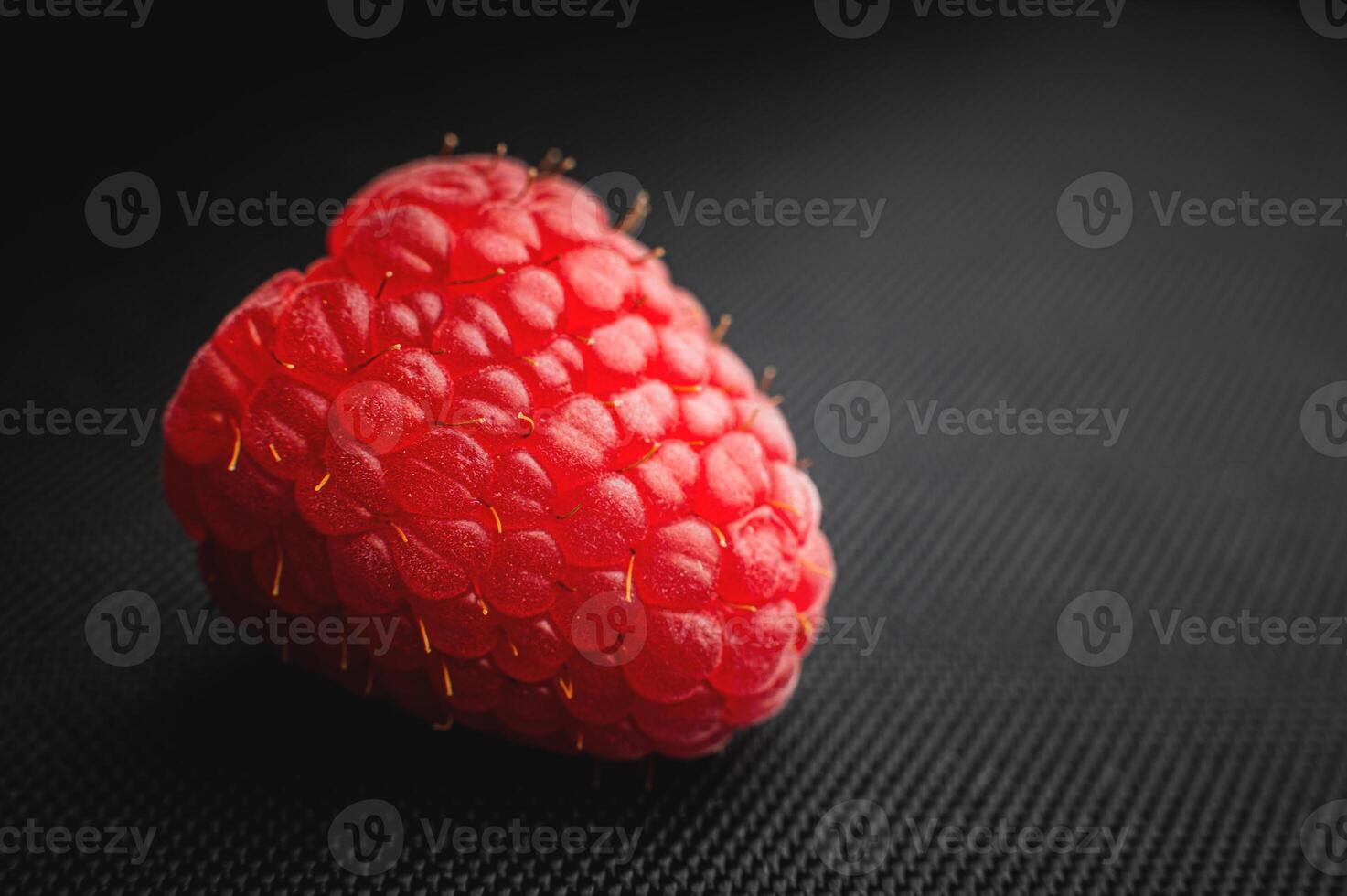 Close up, fresh and ripe red raspberries. Pink raspberry macro shot photo