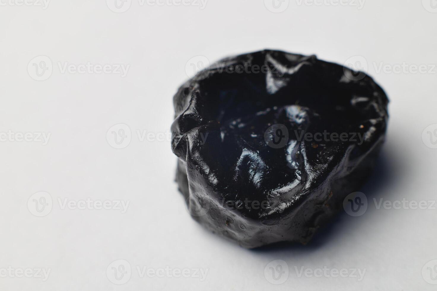 Close-up. Dried fruits. Prunes One piece. Dried prune fruits. photo
