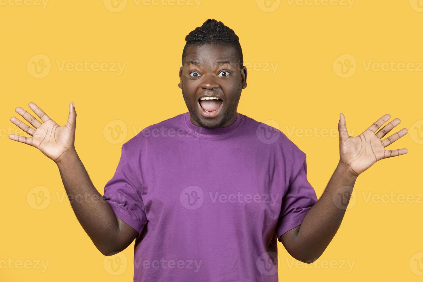 Wow Offer. Excited Black Man Shouting OMG Looking At Camera In Excitement, Gesturing With Hands, Expressing Joy And Surprise Over Amazing News On Yellow Studio Background, Portrait Shot photo