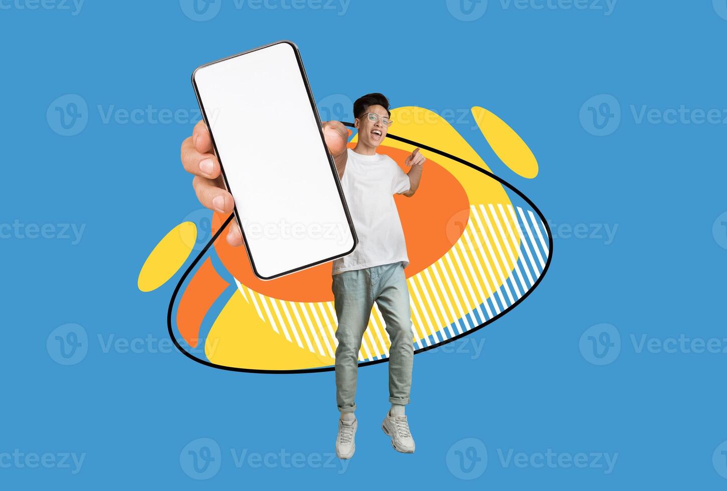 Cheerful Teen Asian Guy Pointing At Big Blank Smartphone In Hand While Jumping Over Colorful Abstract Background, Korean Male Teenager Demonstrating Empty Mobile Phone, Collage, Mockup photo