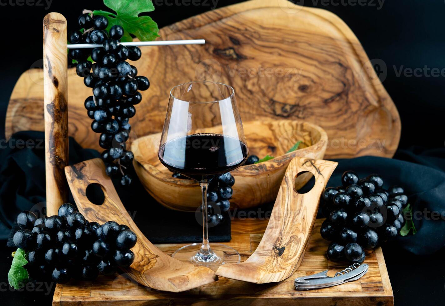 wine grapes on olive wood photo
