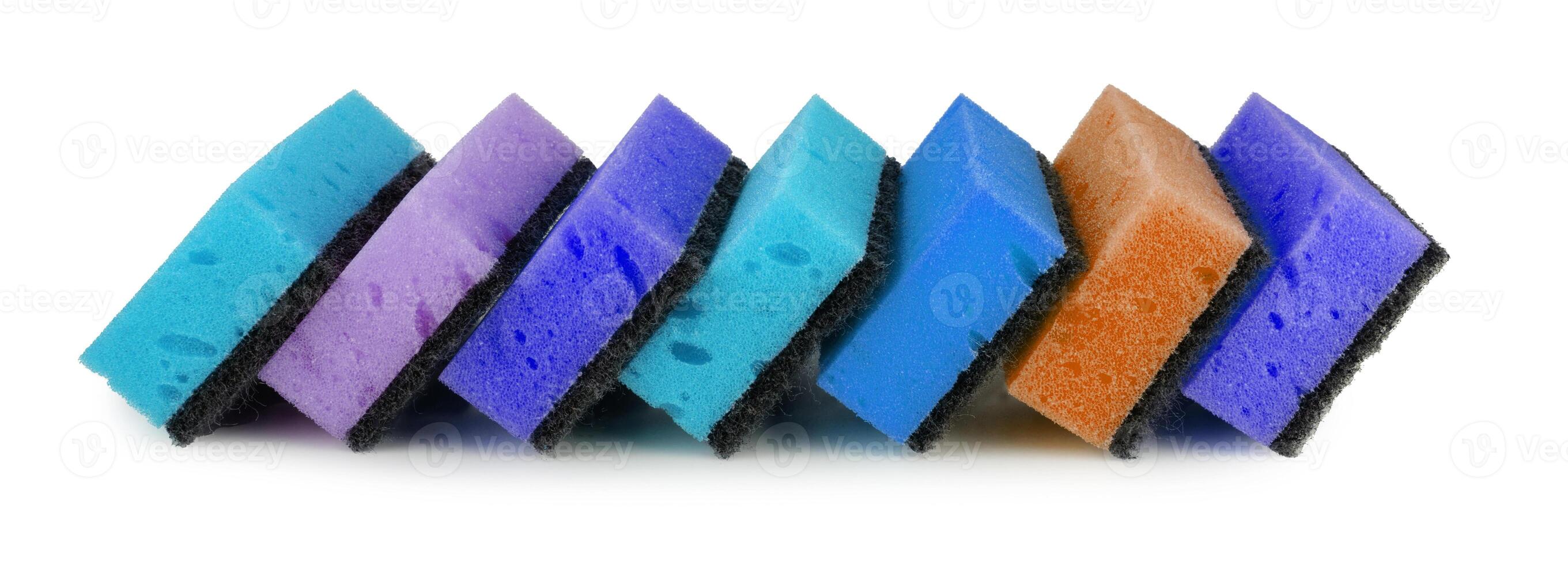 Set of multi-colored household sponges isolated on a white background. photo