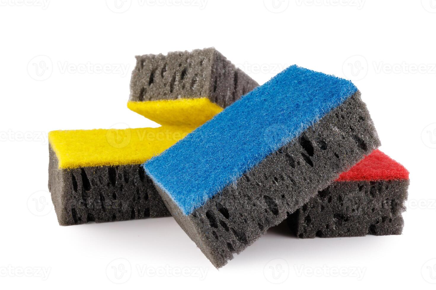 Multi-colored and black household sponges isolated on a white background. Sponge for washing dishes . photo