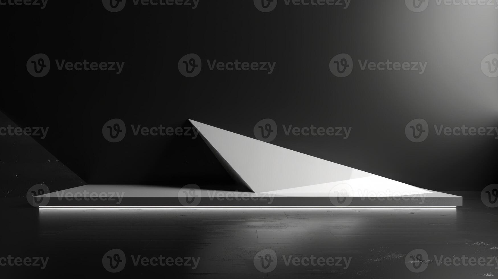 A sleek, angular, white sculpture is placed on a reflective black surface, illuminated dramatically by studio lighting. photo