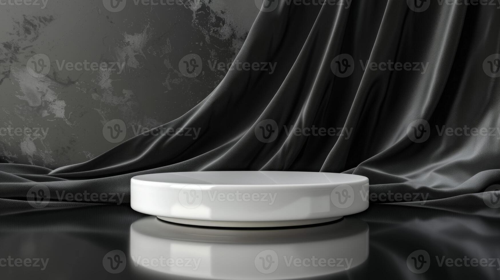 A shiny white round pedestal sits on a black reflective surface, complemented by a background of draped gray silk fabric. photo