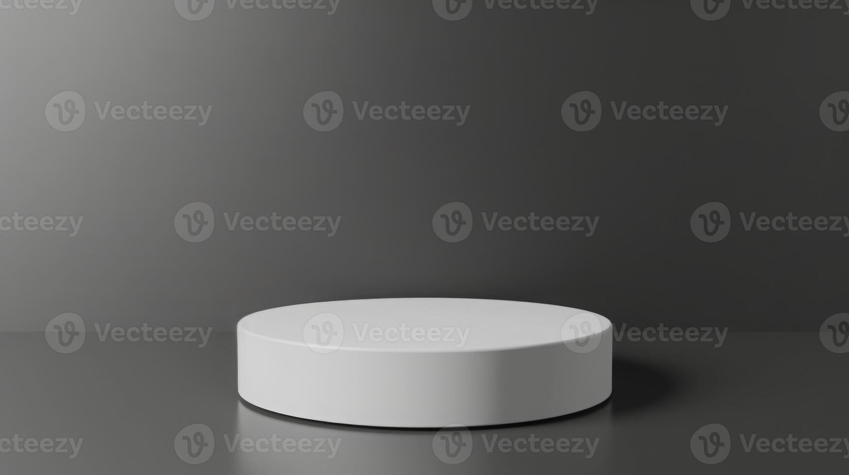 A minimalist round white pedestal is placed in front of a dark gray backdrop under soft studio lighting, creating a clean and modern presentation. photo