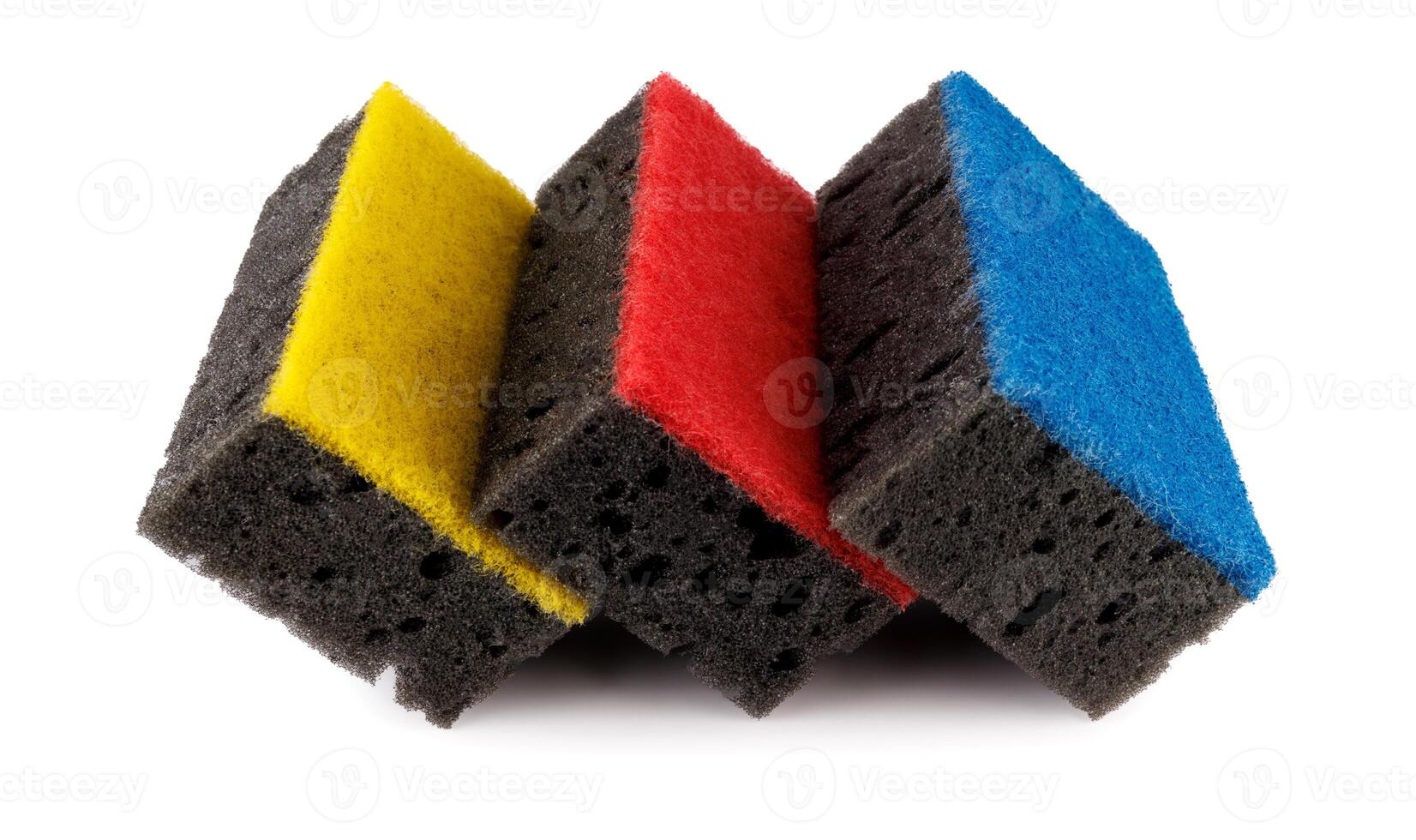 Black and colored household sponges laid out in a row isolated on a white background. Sponge for washing dishes . photo