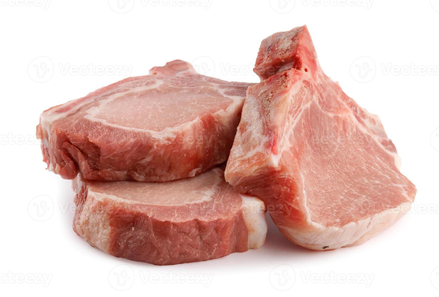Three pork entrecote isolated on a white background. photo