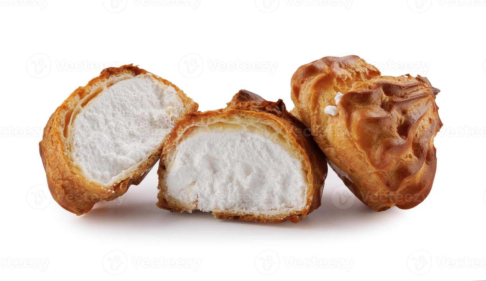 Cut in half and whole porophytole with white cream isolated on a white background. Eclair with cream. photo