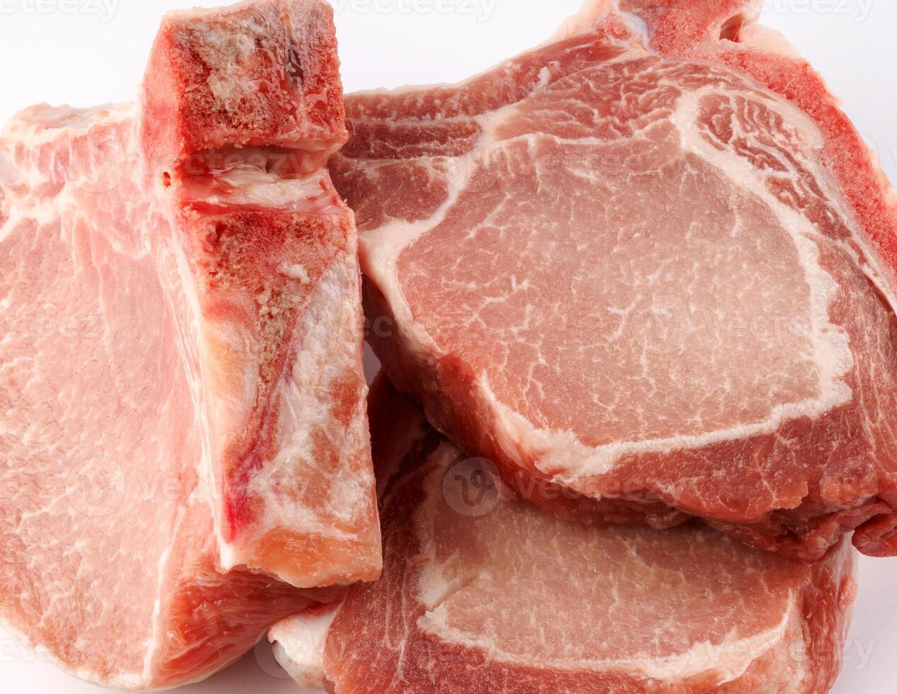 Pork entrecotes on a white background. Pork . photo