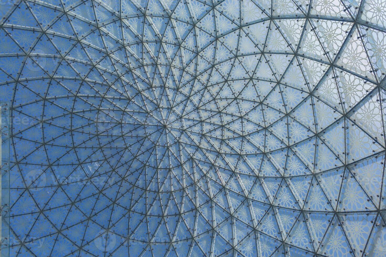 Glass metal structure spiral and shapes. Construction and building design photo