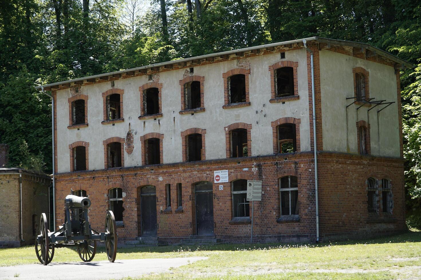 Gizycko, Poland - May 13th 2024 - Cannon and building at former Prussian Boyen Fortress photo