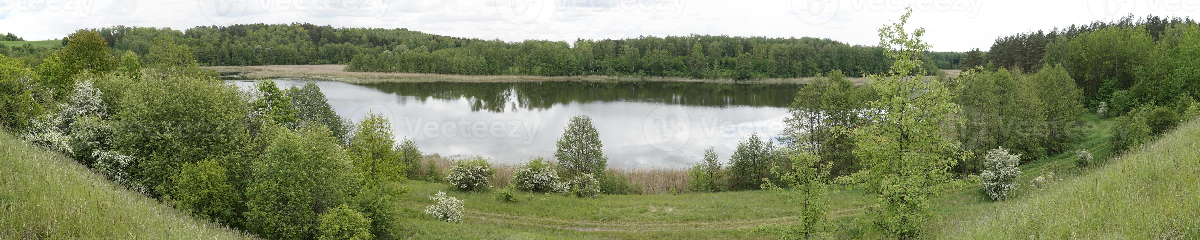 Lake in forest, panorama - Kruklanki, Poland photo