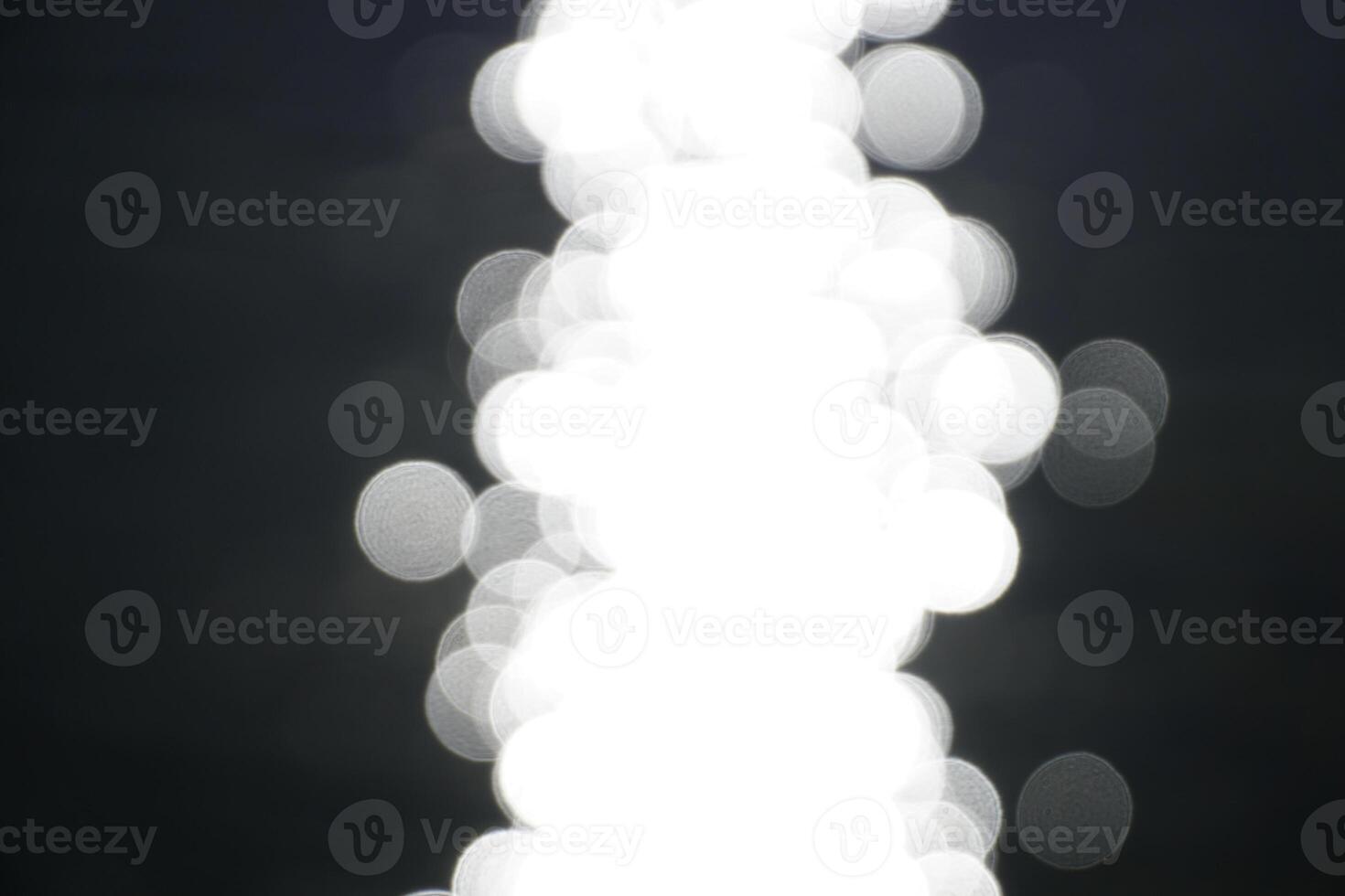 Sun reflecting in water - defocused photograph photo