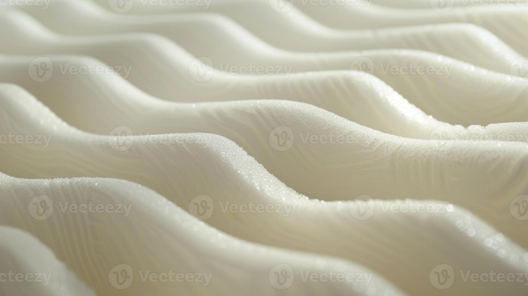 An angled shot showcasing the smooth glossy surface of foam padding with a series of raised parallel lines running across photo