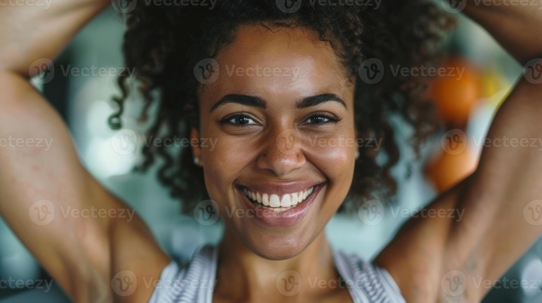 A happy person exercising with the words I am strong and capable in the background photo
